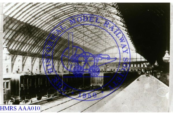 [AAA010] View through train shed toward city end. 4- wheel carriages, 4-wheel, 4-compartment MR 162 identifie