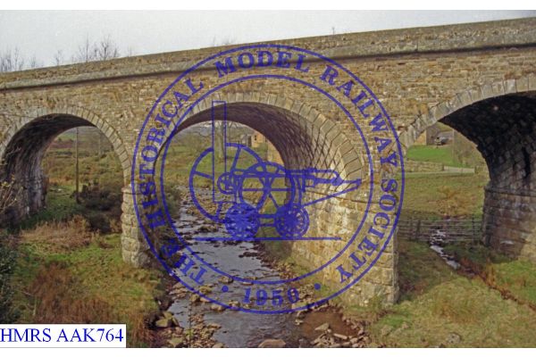 [AAK764] Stone Built viaduct, view west from A689 road. Detailed view of skewed arches crossing Thinhope Burn