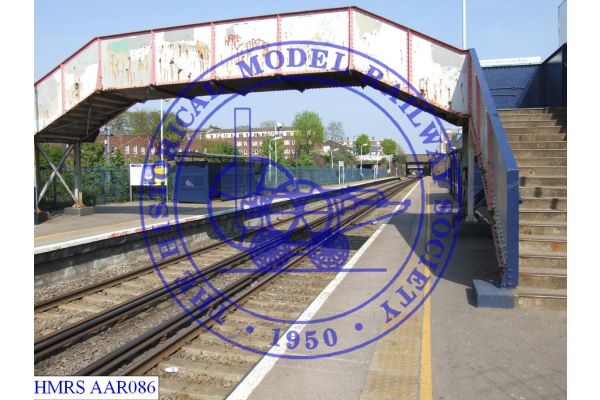 [AAR086] Caledonian Road and Barnsbury Station.  Standing at the west end of the west bound platform looking