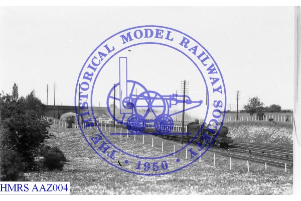 [AAZ004] Unidentified 4-6-0 GW 4073 F3R on 7 car passenger train, bridge background