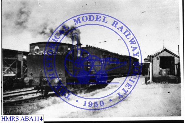 [ABA114] 0-6-0T MSL No. 3 Laxfield ca1910 R3L single platform station on right Carriages ex-Metropolitan Rly,