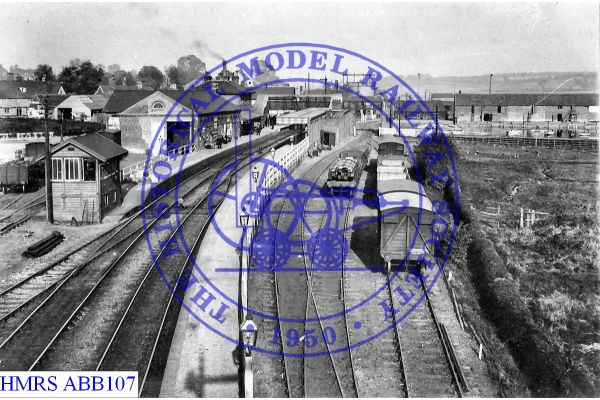 [ABB107] Woodbridge station buildings, goods yard & signal box 1911 northwards Three sidings behind Up platfo