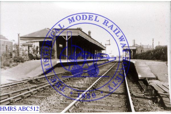 [ABC512] Elmswell, looking E through platforms, main building left, from 4' See also ABC513 for road frontage
