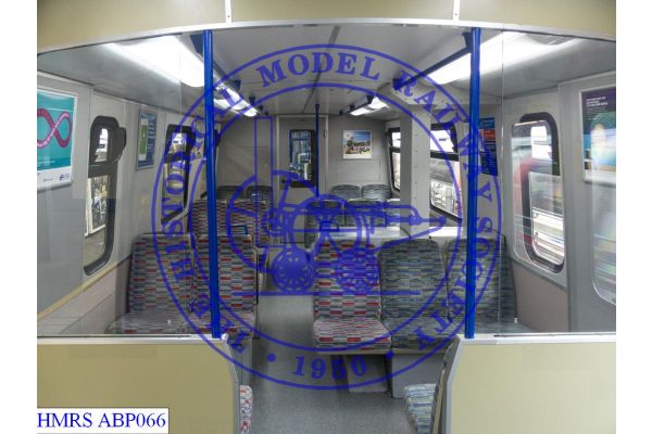 [ABP066] 715858 EMU pantograph carriage 71446 operated by TfL Rail.  Standing in vestibule next to pantograph