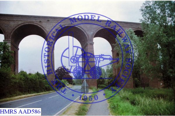 [AAD586] Chappel, 32 arch viaduct, west elevation, centre spans over road. Opened in 1849, 1000 feet long, 70