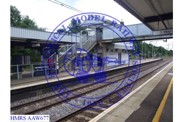 [AAW677] Platform 2 side of platform 2 and 1 island platform.  Southern quarter of.  Shows steps coming down