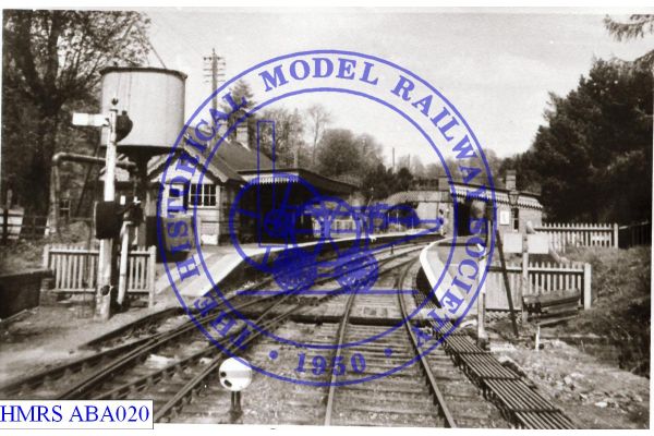 [ABA020] Spalding station frontage and forecourt with 5 parked cars 1952 Taken from approach road looking nor