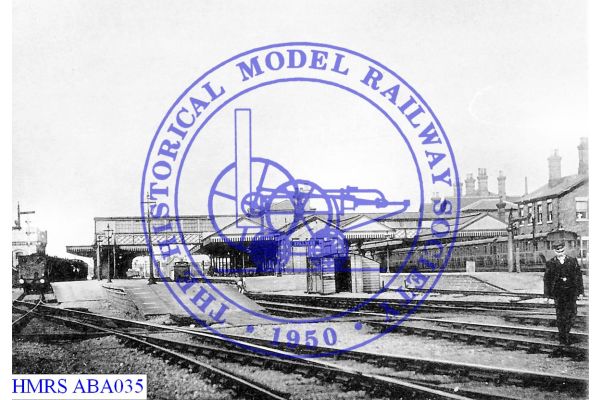 [ABA035] Spalding view through station ca1911 northwards from trackside Water tower at left, footbridge serve