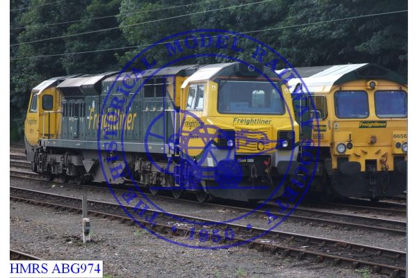 [ABG974] Freightliner 70019 three quarter view of with roof fans furthest from the camera.  Cab end part of F