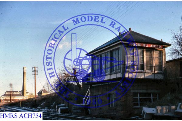 [ACH754] Dudding Hill junction signal box F3LWin from below bridge on frosty day. xMR wooden building top sit