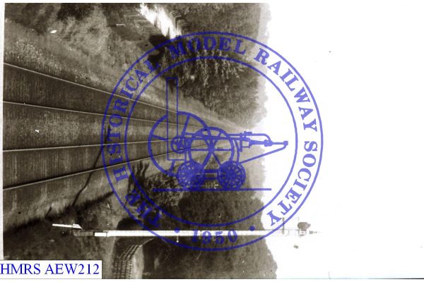[AEW212] Sutton Park, aloft view along tracks, rear tall distant signal right. 3/4 milepost by signal. Overbr